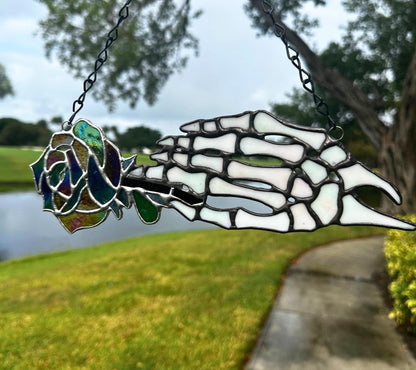 Stained Glass Skeleton Hand with Iridescent Rose – Gothic Window Suncatcher, Handmade Wall Hanging Art