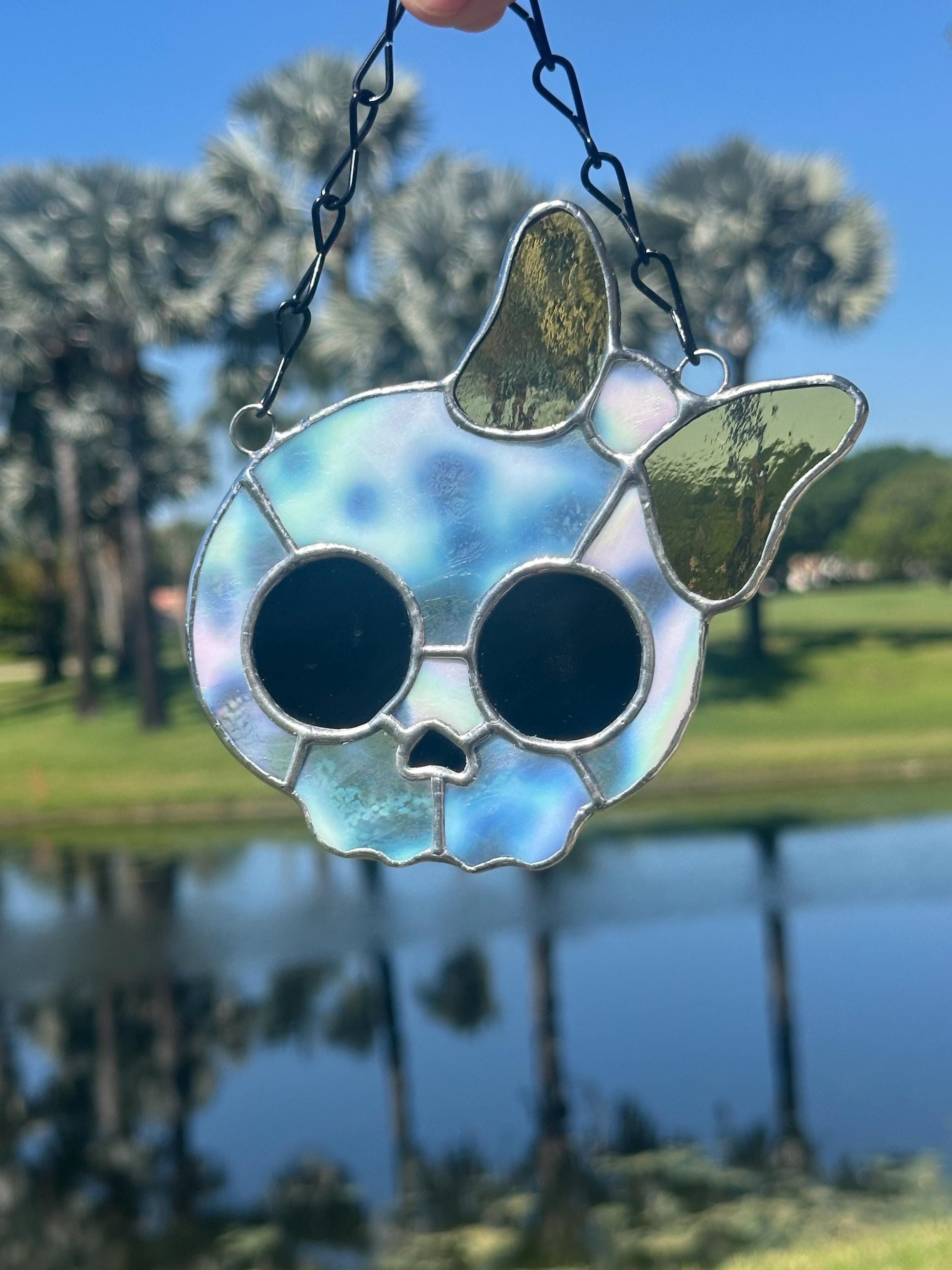 Stained Glass Skull Suncatcher with Bow Accent – Gothic Window Decor